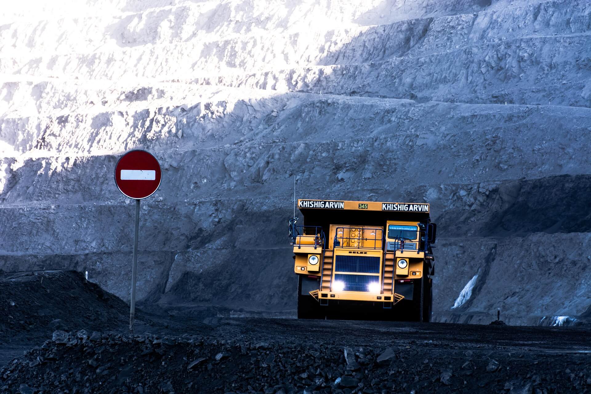 Open cast heavy mining operations with haul truck